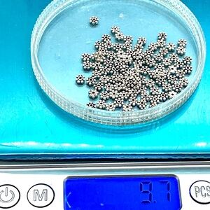 Lot of 9.7 grams of 4mm Sterling Silver Spacer Beads
